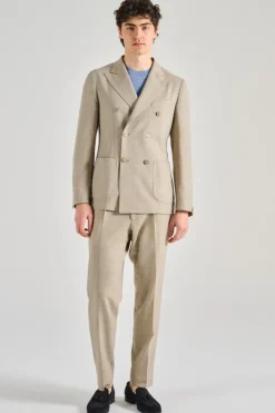 Abito il viaggiatore tessuto beige