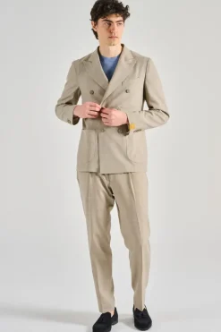 Abito il viaggiatore tessuto beige