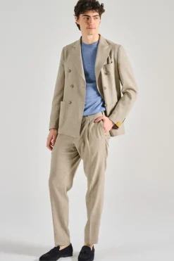 Abito il viaggiatore tessuto beige