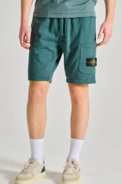 Shorts viola tessuto verde