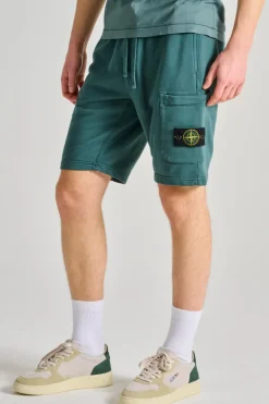 Shorts viola tessuto verde