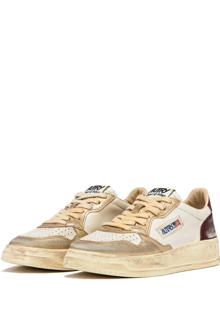 Sneakers super vintage pelle oro