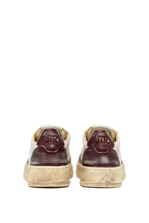 Sneakers super vintage pelle oro